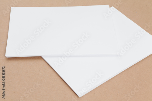 mock up concept. cards Papers on beige background. Top view, flat lay, copy space © NewFabrika