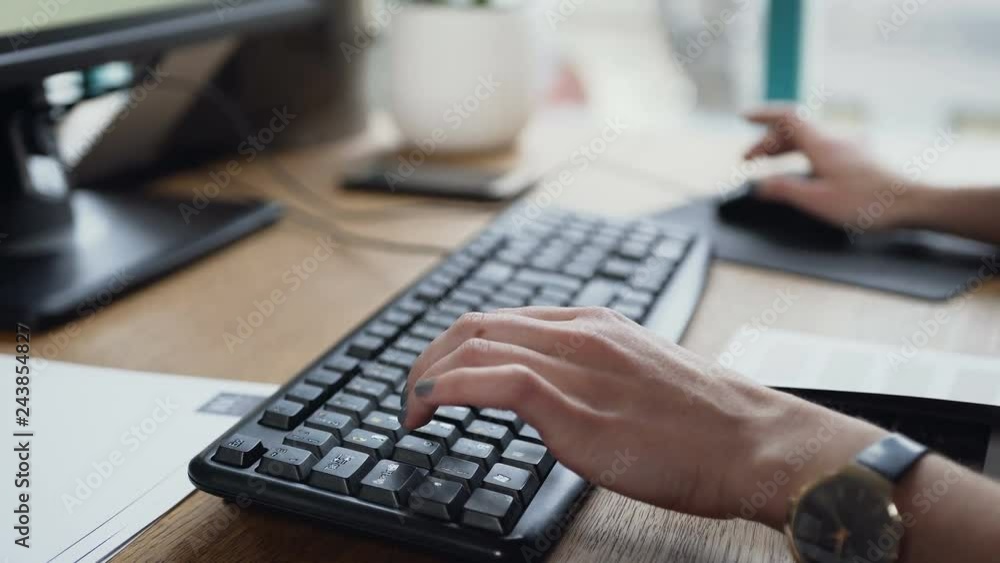 Close up shot of woman hand typing on the laptop keyboard. Close up shot of woman hand typing on the laptop keyboard.