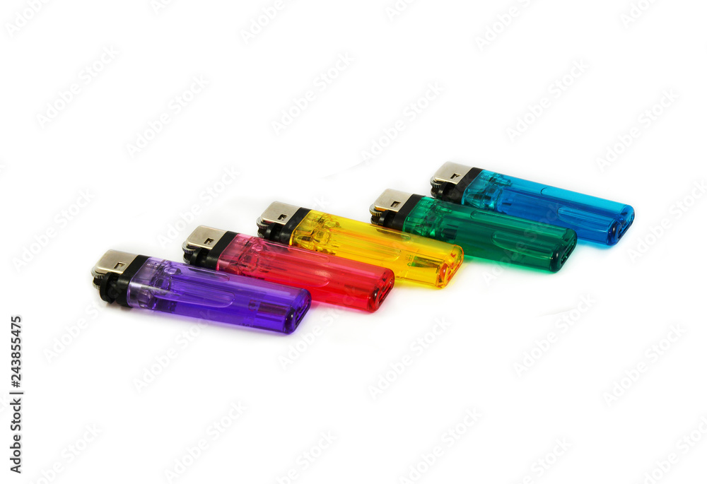 Plastic lighter / Close up of colorful plastic gas lighters isolated on white background Plastic lighter / Close up of colorful plastic gas lighters isolated on white background