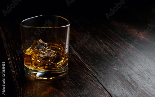 whiskey with ice in modern glasses