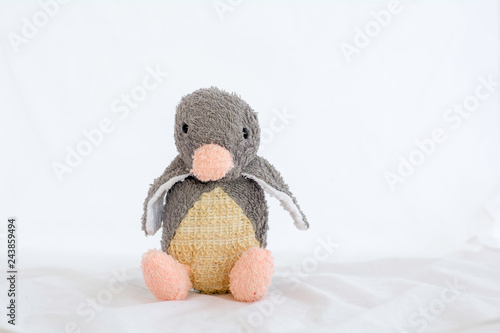 Penguins doll on a white background.