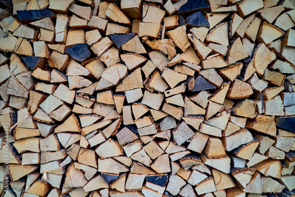 Log of wood for the winter in mountain hut with the name Log of wood for the winter in mountain hut with the name