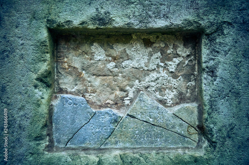 Fototapeta Naklejka Na Ścianę i Meble -  LOPIENKA, POLAND - NOVEMBER 03, 2018: Grave in the old Lemko cemetery in the Bieszczady mountains (Poland) on a misty autumn day