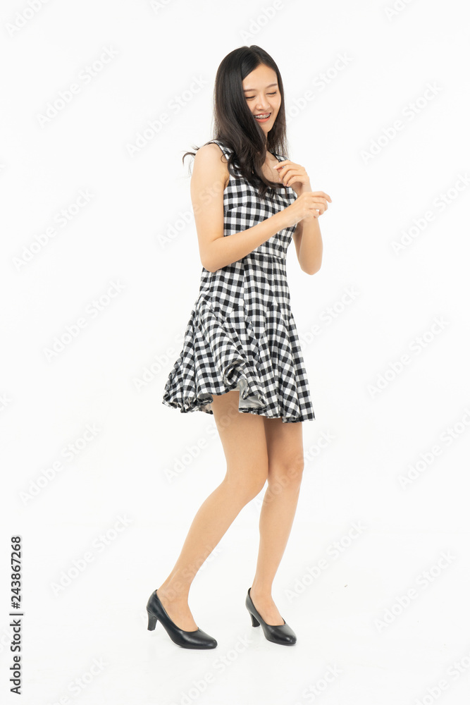 portrait of excited surprised attractive inspired girl jumping up isolated on background.Freedom legs stylish feet glamorous people teenager asian. portrait of excited surprised attractive inspired girl jumping up isolated on background.Freedom legs stylish feet glamorous people teenager asian.