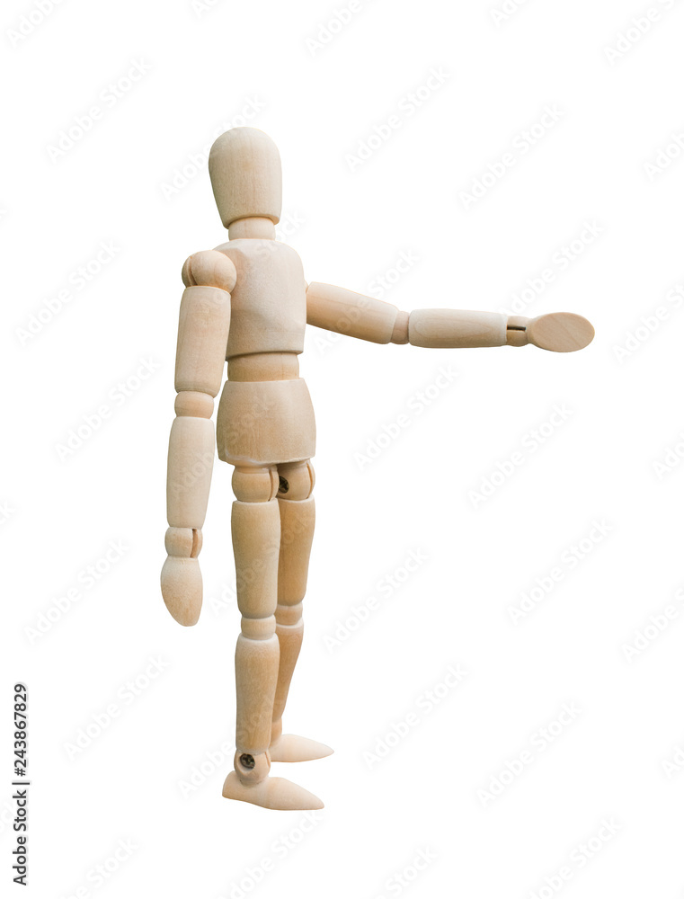 Wooden puppet standing and pointing his hand to the left. A Standing wooden dummy isolated on white background Wooden puppet standing and pointing his hand to the left. A Standing wooden dummy isolated on white background