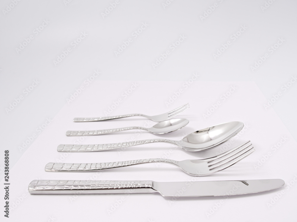 silverware forks spoons knives cutlery on a white background silverware forks spoons knives cutlery on a white background