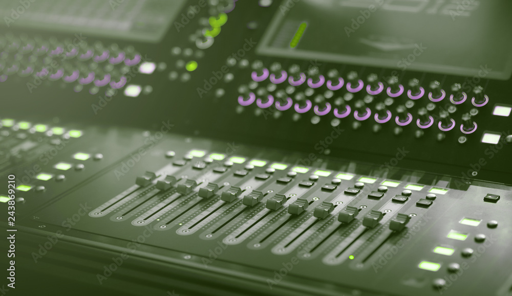 Light and Sound control mixer for Event on stage. Professional backstage device equipment. Professional sound and audio mixer control panel with buttons and sliders. Light and Sound control mixer for Event on stage. Professional backstage device equipment. Professional sound and audio mixer control panel with buttons and sliders.