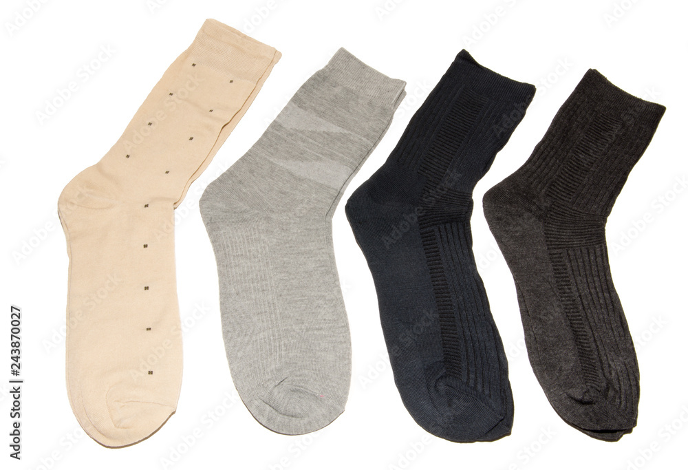 Four pairs of multi-colored thin socks. Thin, summer running socks. Isolated on white background. Four pairs of multi-colored thin socks. Thin, summer running socks. Isolated on white background.