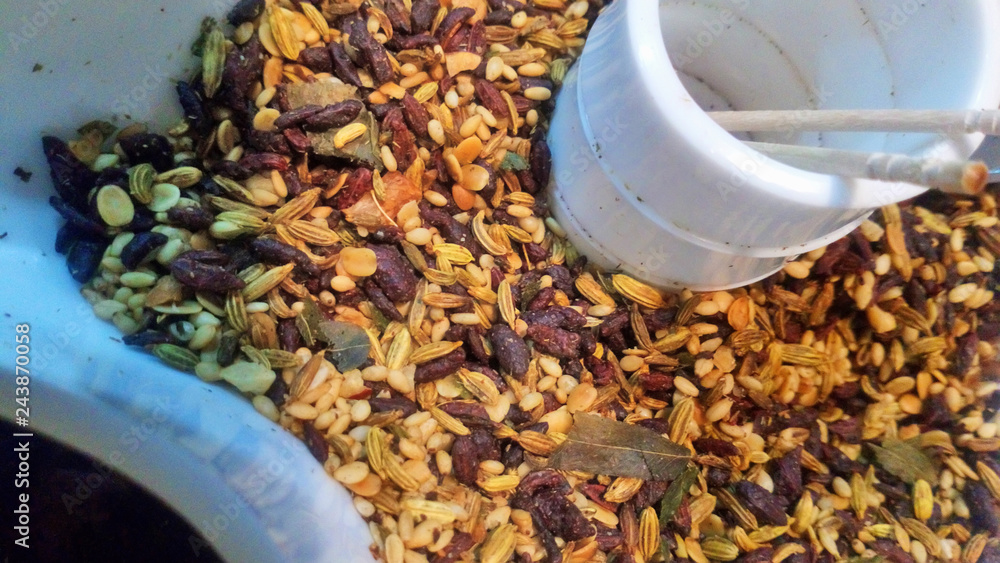 Spices and herbs in white bowls. Colorful natural additives. Indian cuisine Spices and herbs in white bowls. Colorful natural additives. Indian cuisine