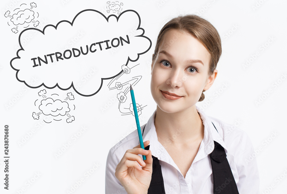 The concept of business, technology, the Internet and the network. A young entrepreneur working on a virtual screen of the future and sees the inscription: introduction The concept of business, technology, the Internet and the network. A young entrepreneur working on a virtual screen of the future and sees the inscription: introduction