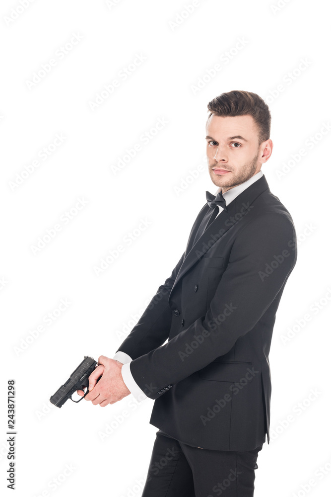 handsome killer in black suit holding gun, isolated on white handsome killer in black suit holding gun, isolated on white