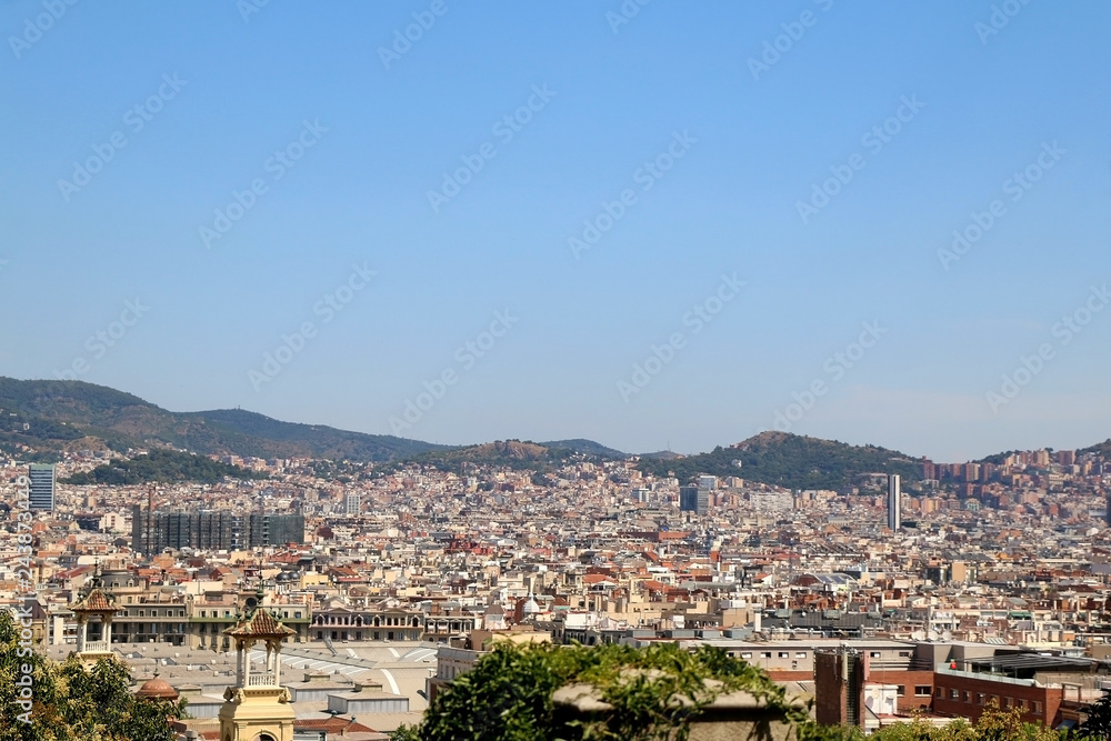 Aerial view of Barcelona, Spain from Montjuïc hill on a sunny day.