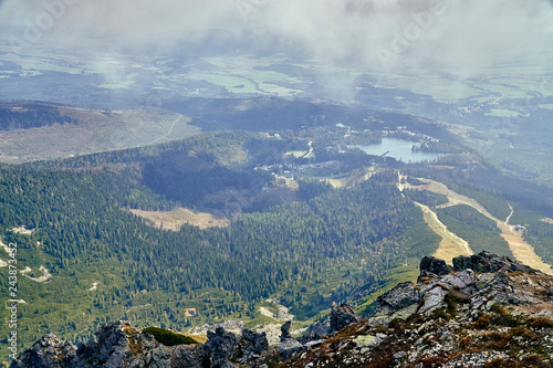 Beautiful panoramic view of Strbske Pleso (Hungarian: Csorbato or Csorba-to, German: Tschirmer See, Polish: Szczyrbskie Jezioro) - is a favorite ski, tourist, and health resort in the High Tatras, Slo photo