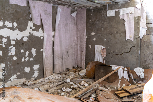 Hall of an abandoned building in the dark