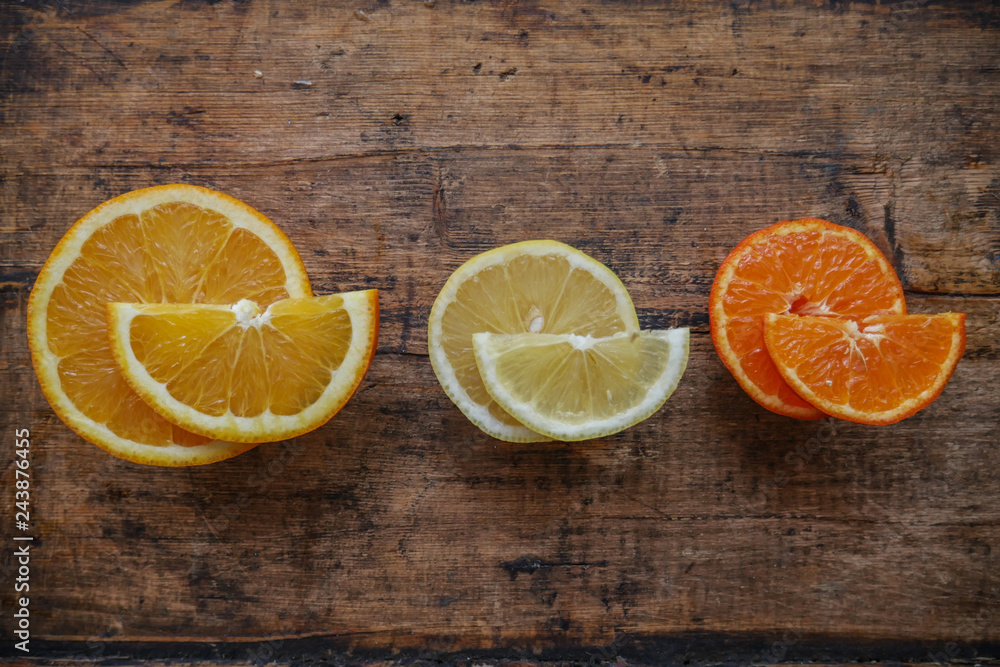 Fresh citrus fruits half cut and lined up Fresh citrus fruits half cut and lined up