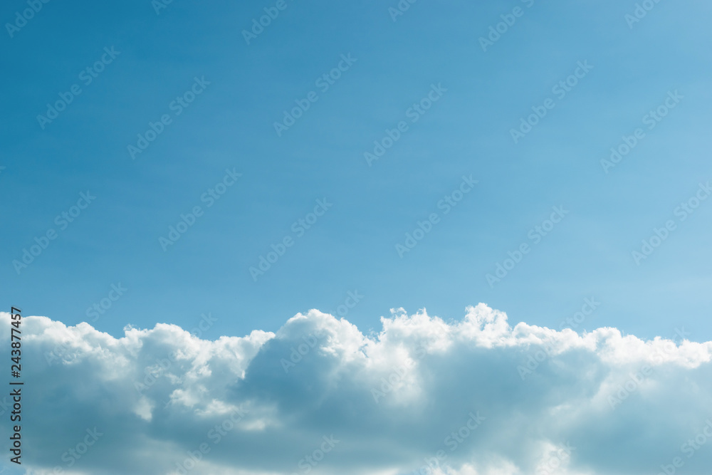 fluffy cloud above clear blue sky fluffy cloud above clear blue sky
