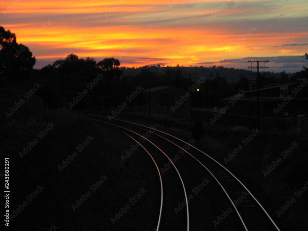 Rail tracks of train at sunset. US railway