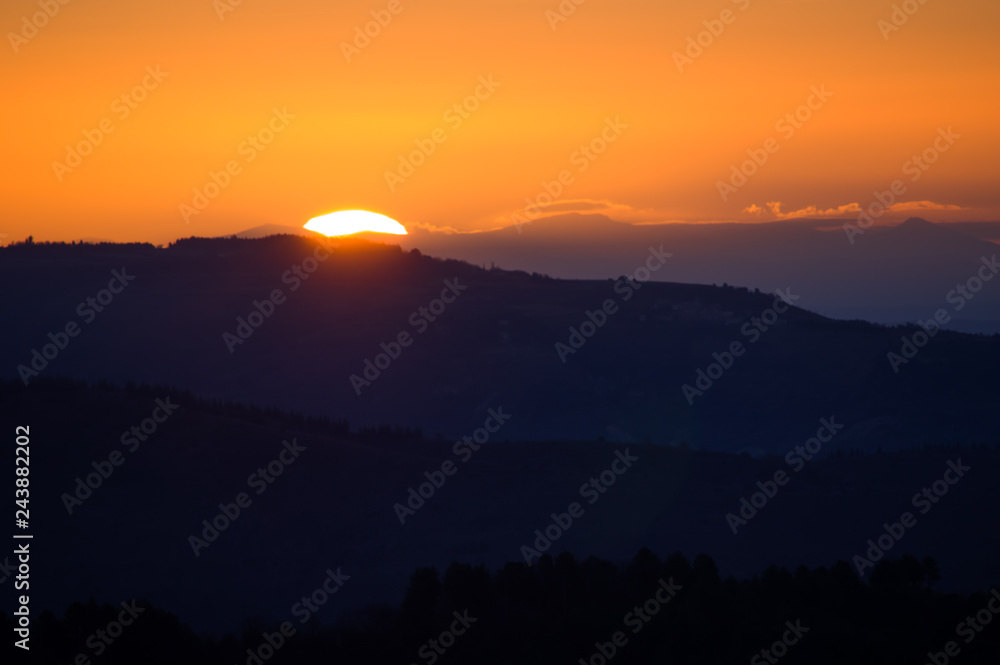 silhouette sunset mountain fog valley