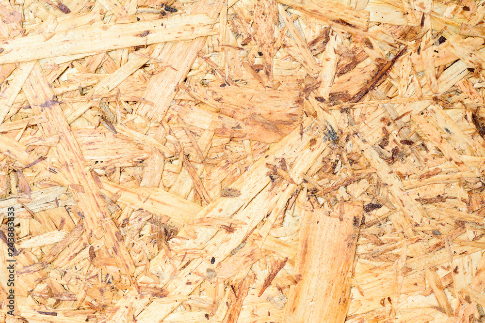 OSB surface texture and background, made of brown wood chips sanded into a  wooden chipboard. Close up view of MDF plywood veneer. foto de Stock |  Adobe Stock