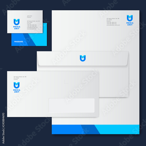 M and U letters like a shield. M, U origami monogram consist of blue ribbon. Corporate style, envelope, letterhead, business card.
