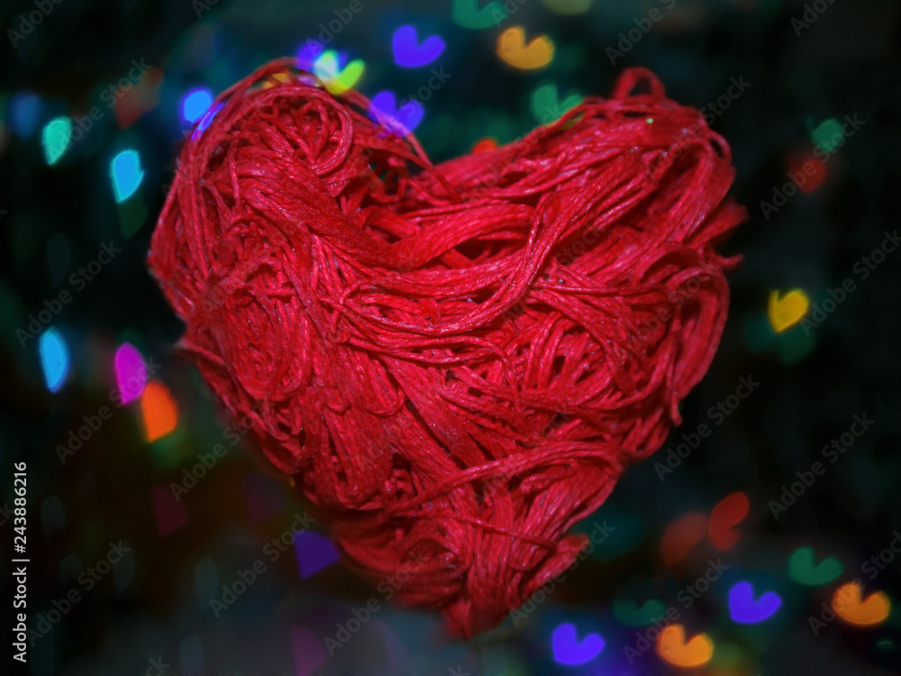 A card with a heart as a recognition of their tender love for a person on a bright holiday, on St. Valentine's Day