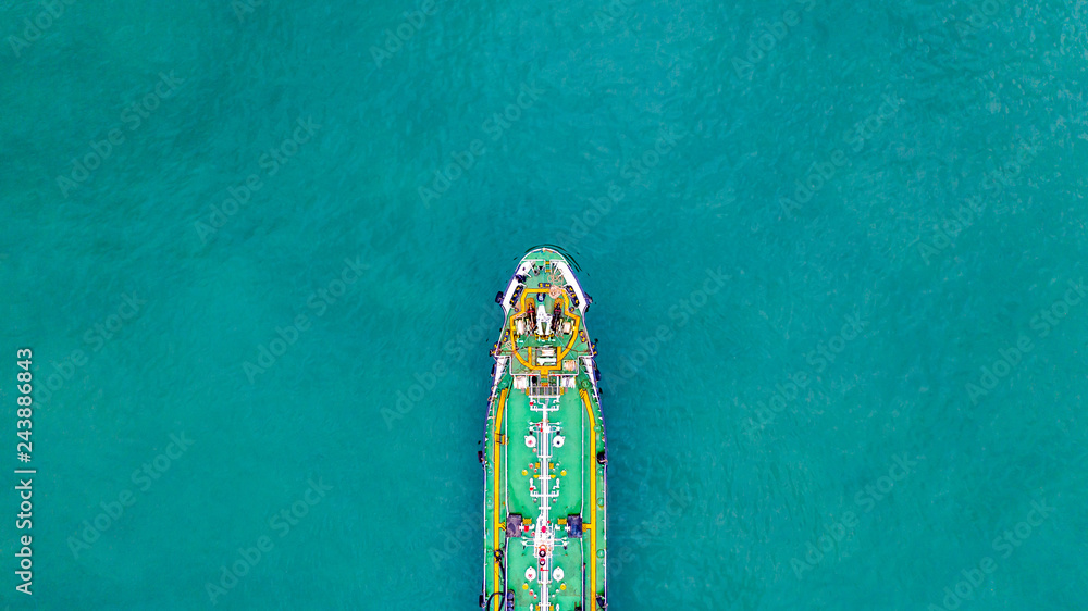 Tanker ship carrying oil and gas in the sea support freight transportation import export business logistic, Aerial view tanker ship. Tanker ship carrying oil and gas in the sea support freight transportation import export business logistic, Aerial view tanker ship.