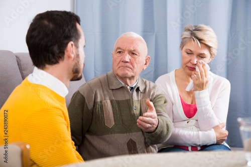 Grandfather teaches  grandson