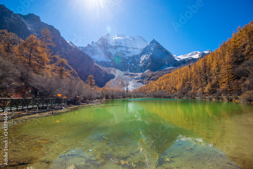 pearl lake with snow mountain in yading nature reserve, Sichuan, China.
