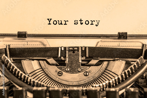 your story is printed on a sheet of paper on a vintage typewriter. journalist, writer.