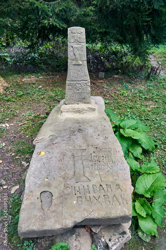 Fototapeta Naklejka Na Ścianę i Meble -  Old cemetery in the village Berechy Gorne, Bieszczady mountains in the early autumn, Bieszczady National Park (Polish: Bieszczadzki Park Narodowy), Poland.