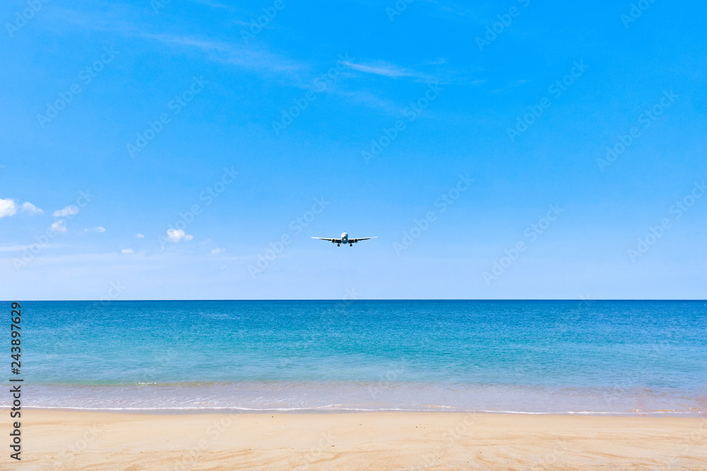 Plane is landing over water