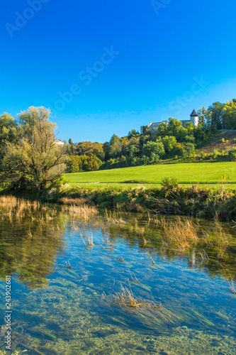 Croatian countryside landscape, river Dobra and old fortress in Novigrad, Karlovac county, beautiful autumn 