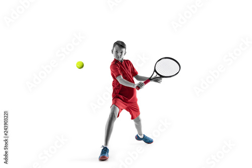 Young teen boy tennis player in motion or movement isolated on white studio background. The sport, exercise, training concept © master1305