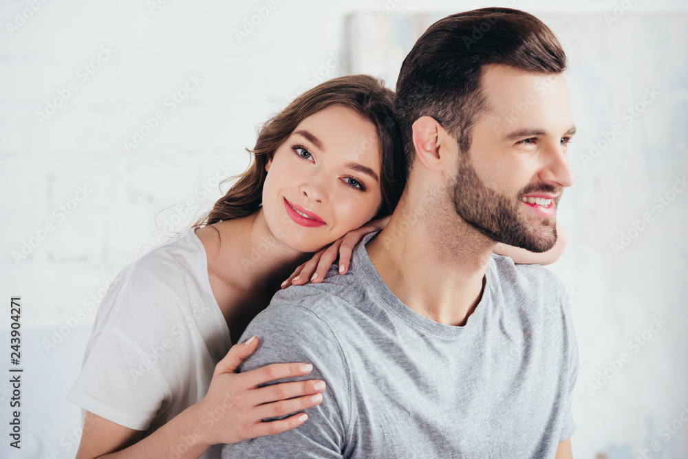 selective focus of loving woman gentle embracing man selective focus of loving woman gentle embracing man