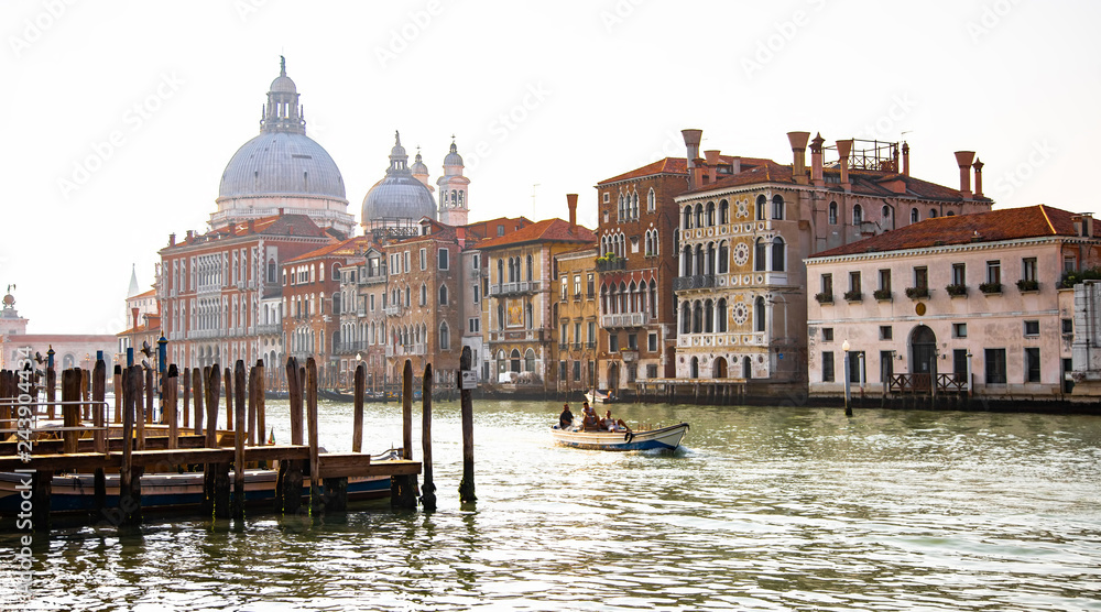 Italy beauty, boat and cathedral Santa Maria della Salute on Grand canal in Venice , Venezia