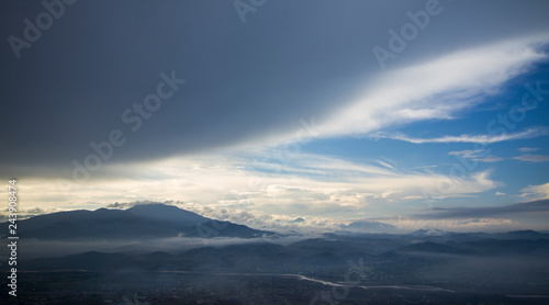 Chasing clouds over earth landscape composition over Albania