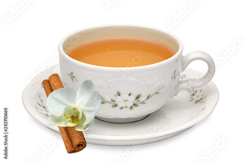 Herbal tea in cup with leaves isolated on white background including clipping path