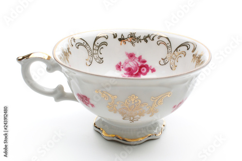 Photography Empty antique porcelain tea cup isolated on white background