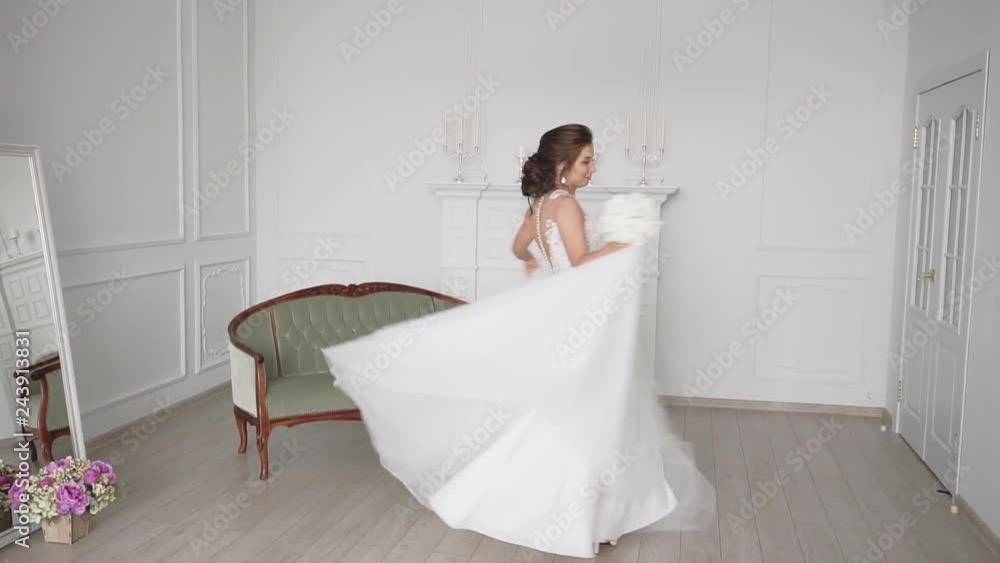 morning of the bride, a beautiful woman in a white dress is preparing for the wedding, slow motion morning of the bride, a beautiful woman in a white dress is preparing for the wedding, slow motion