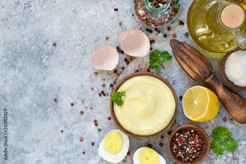 Fotografie Mayonnaise is a classic homemade salad dressing. Top view.