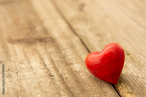 Two red hearts on wooden background, close-up, Valentine's day, celebrating love.