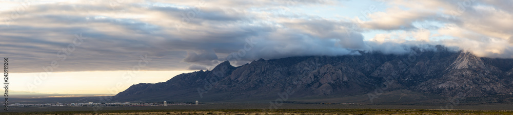 Beautiful Panoramic American Landscape during a cloudy sunrise. Taken North of El Paso, New Mexico, United States. Beautiful Panoramic American Landscape during a cloudy sunrise. Taken North of El Paso, New Mexico, United States.