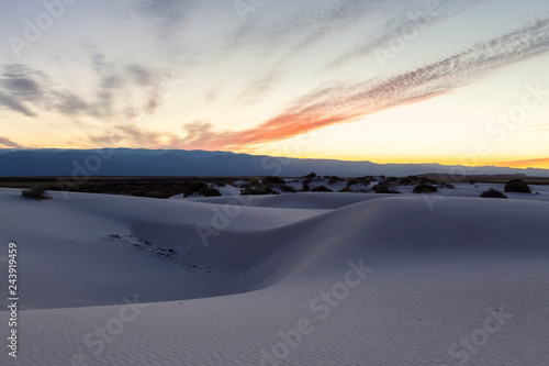 Beautiful view of white sand during a colorful sunrise. Taken in White Sands National Monument  New Mexico  United States.