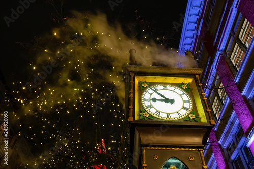 Steam Clock during a dark winter night in Gastown, Downtown Vancouver, BC, Canada.