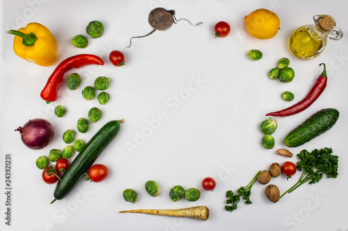 seasonal vegetables - broccoli, bell peppers, tomatoes, onions, garlic with spices and herbs. Ingredients to prepare vegetable side dish. Healthy vegetarian food concept. Vegetables background. isolat