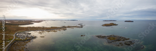 Aerial panoramic view of L Anse aux Meadows National Historic Site on the Atlantic Ocean Coast. Taken in Newfoundland  Canada.