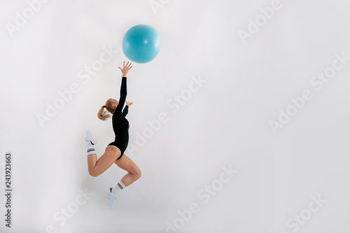 young athletic girl engaged in fitness with the ball © ZUYEVICH