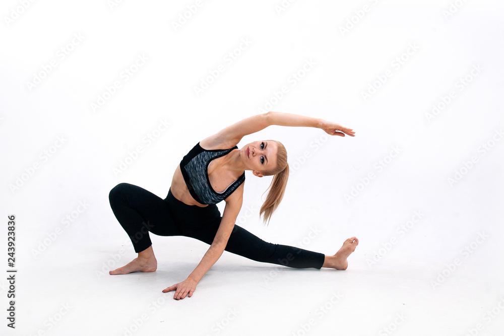 young athletic girl doing stretching