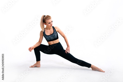 young athletic girl doing stretching