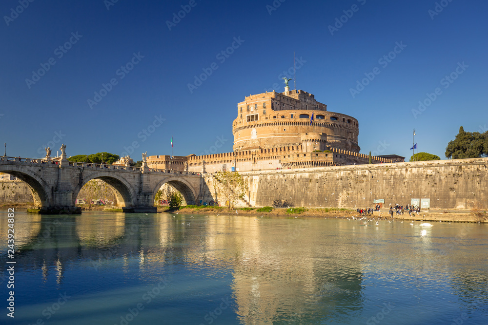 Bridge to the Saint Angel Castle over the Tiber river in Rome, Italy